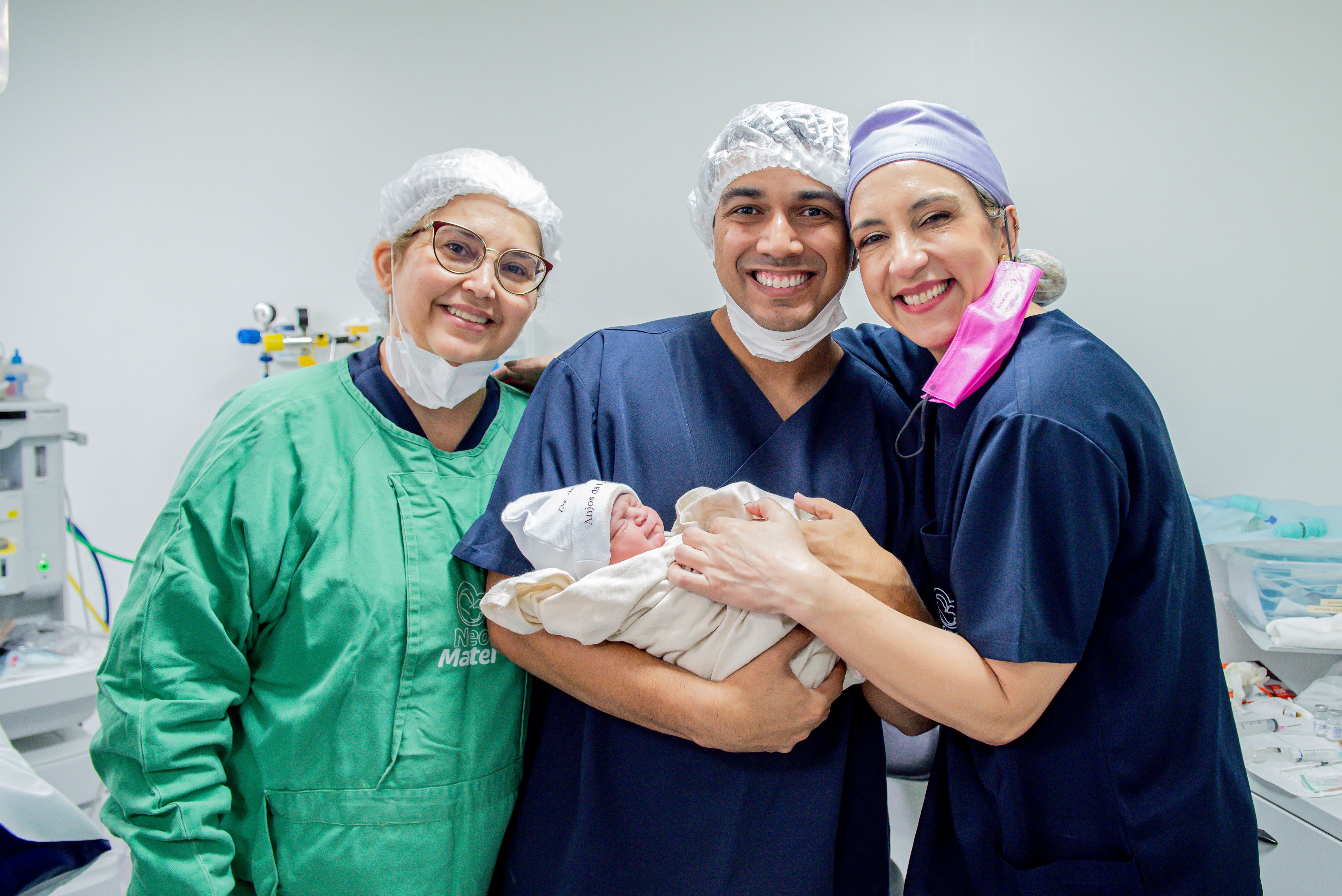 Oncology care team supporting a patient and family member